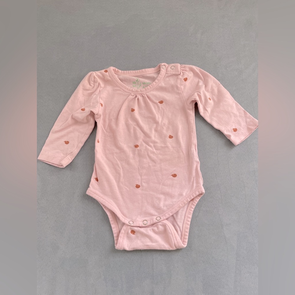 Kate Quinn peaches onesie